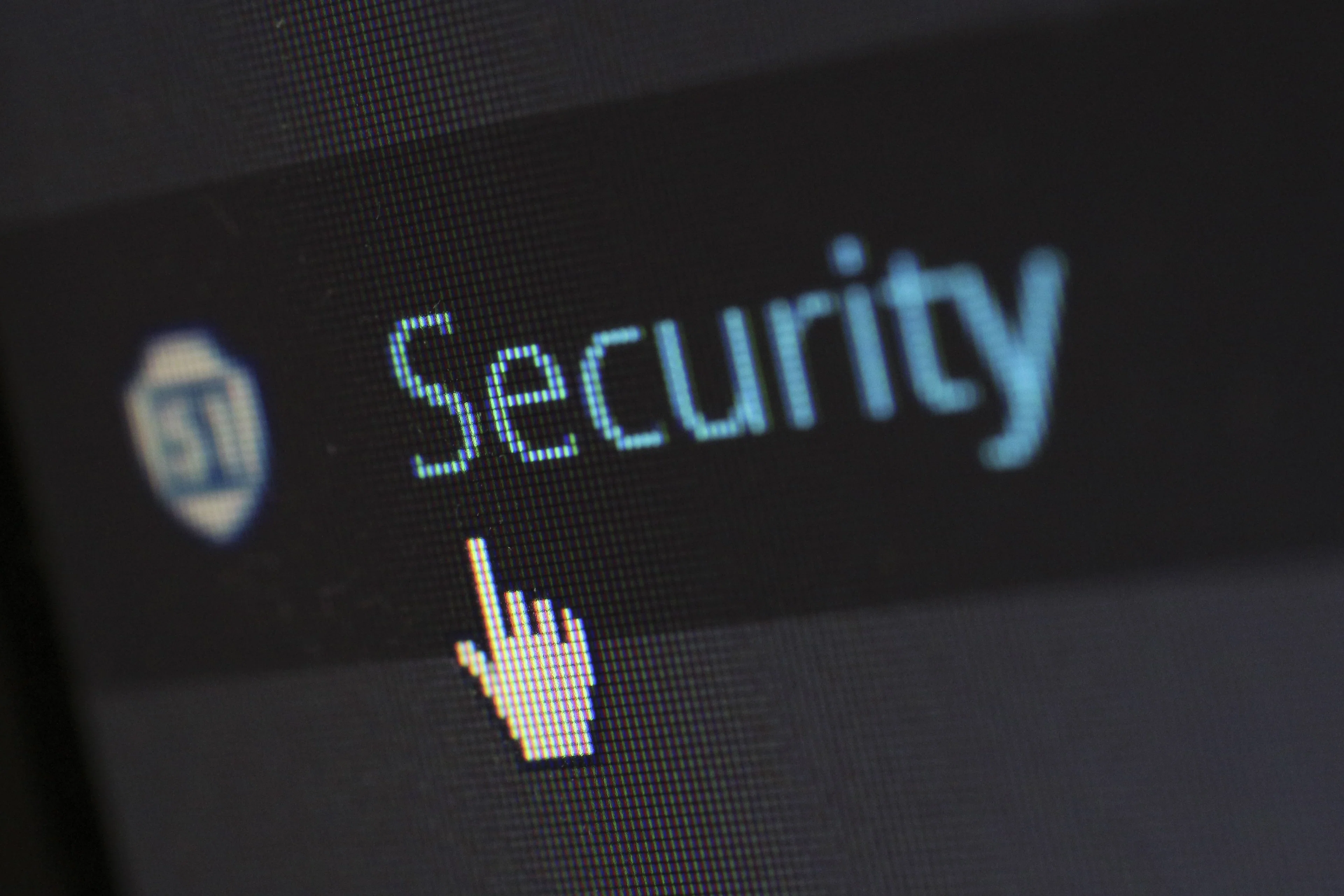 digital screen displaying the word security with a black background and blue font